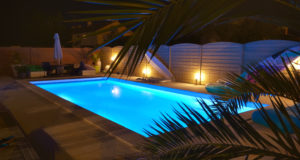 Pool at night with professional lighting